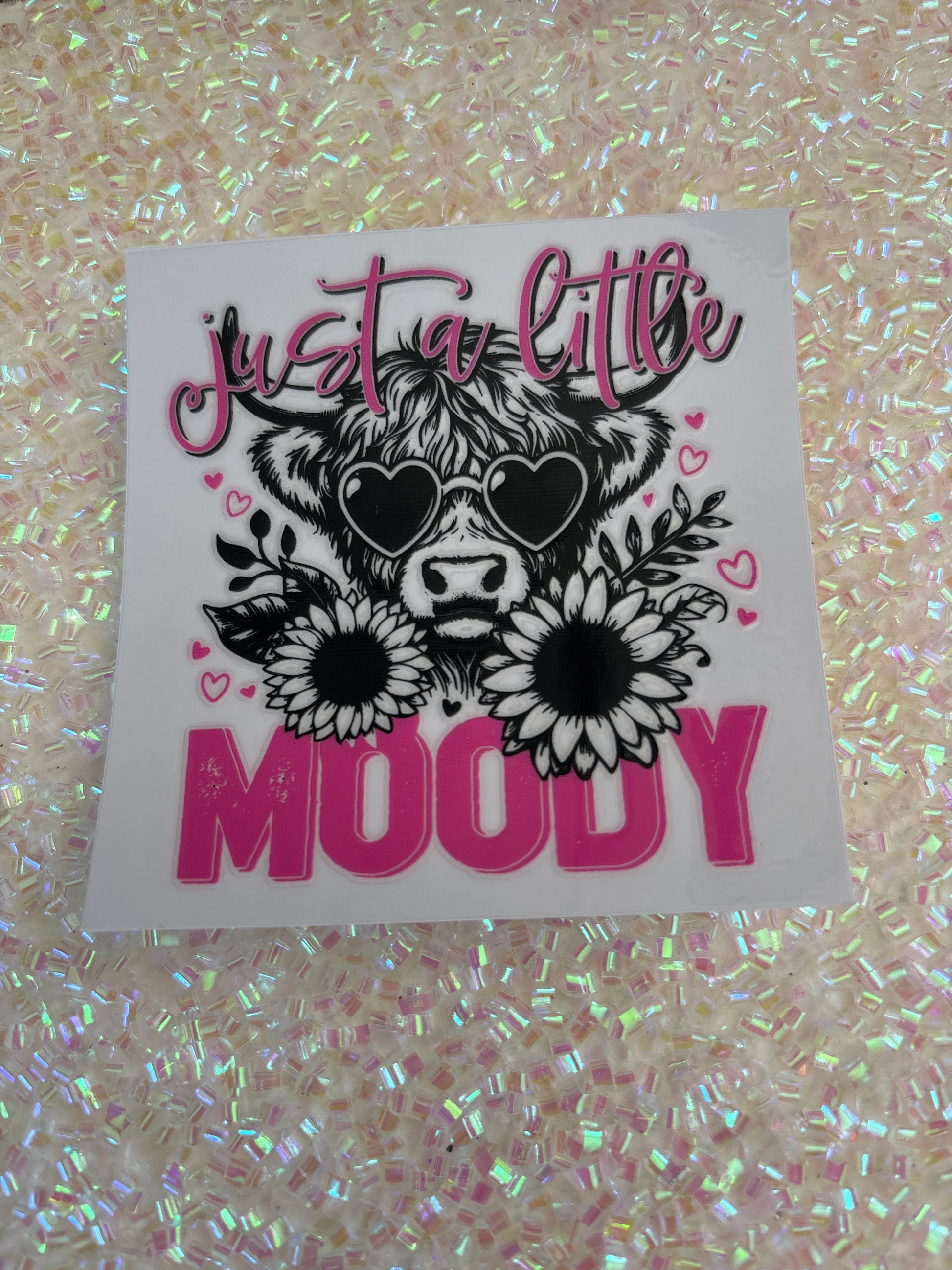 Just a little moody cow with sunflowers