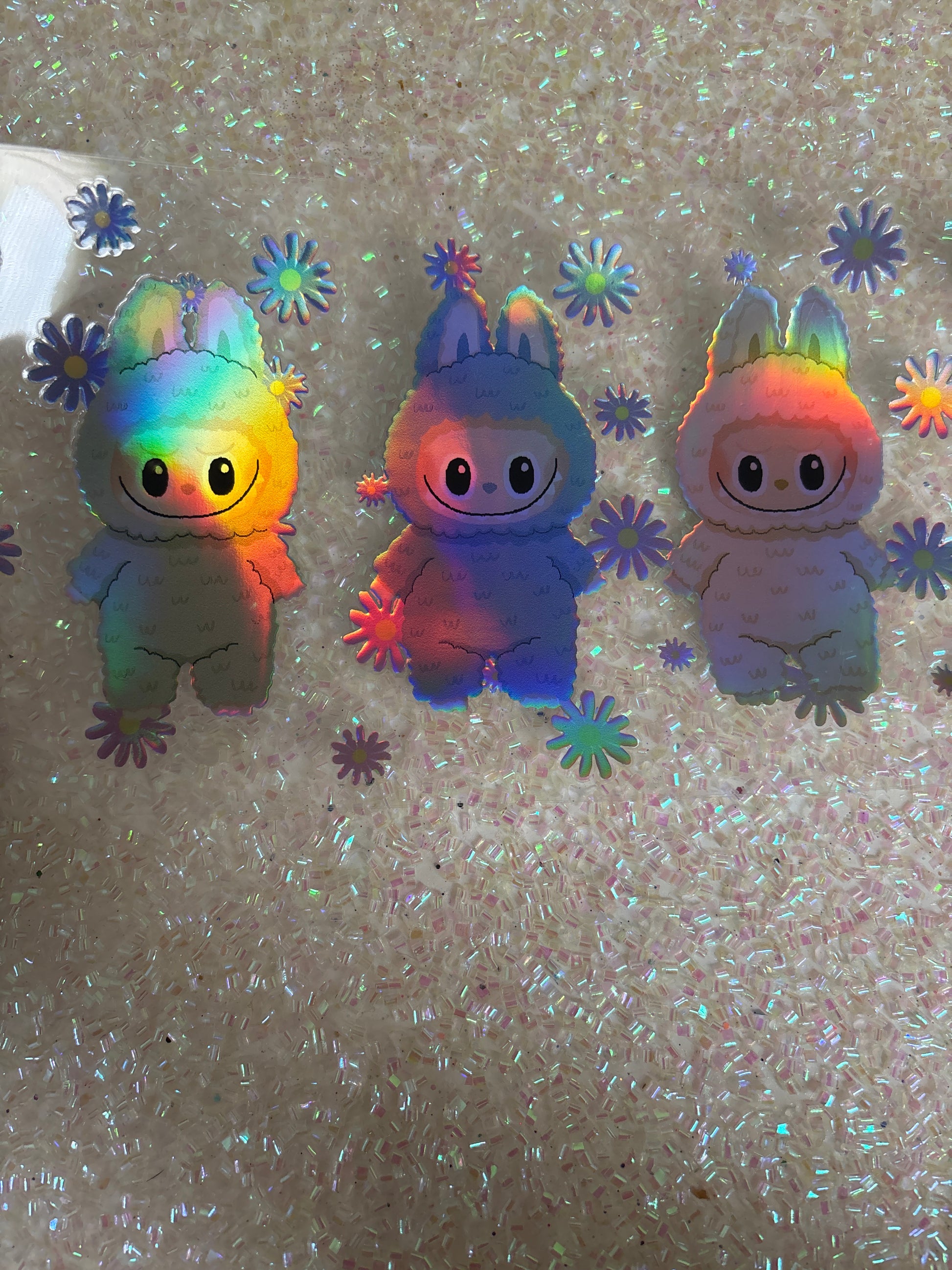 Holographic Labubu with flowers