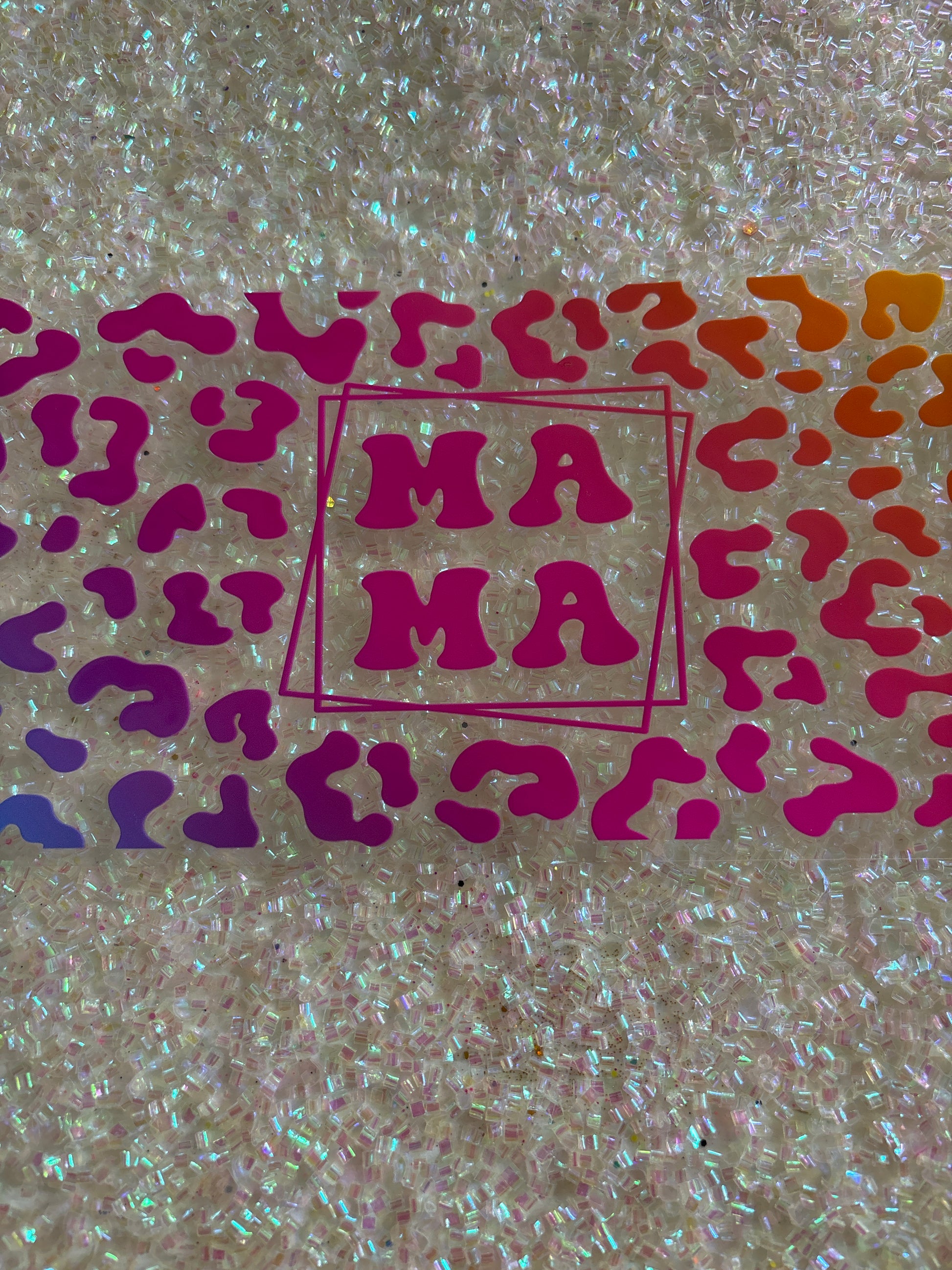 MAMA with bright coloured cheetah print background