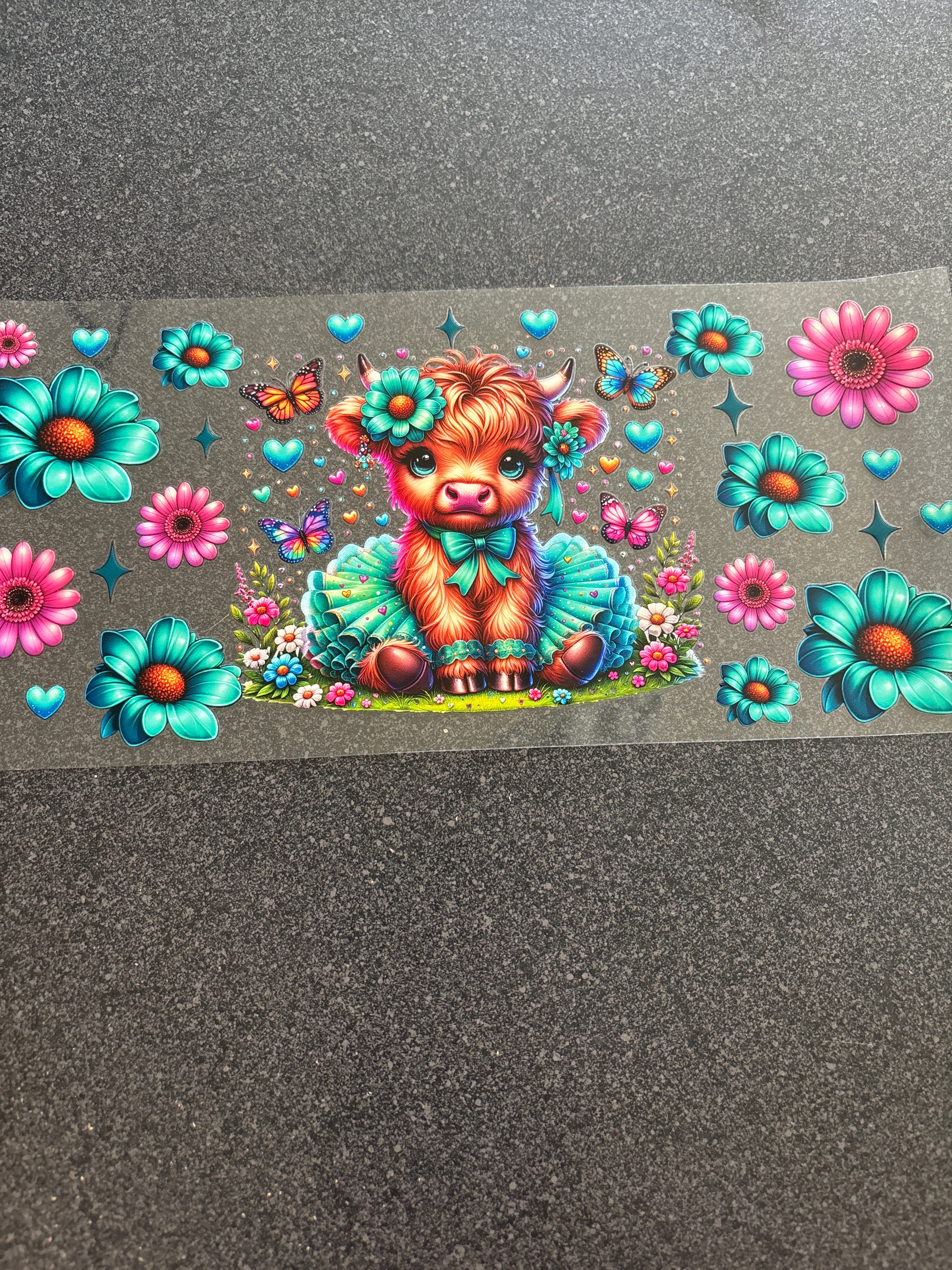 Highland cow with teal and pink flowers