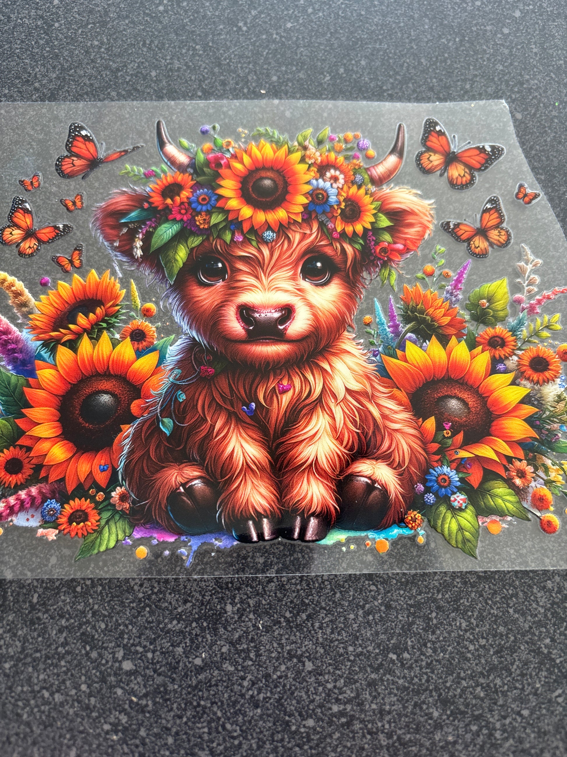 Highland cow with butterflies and sunflowers