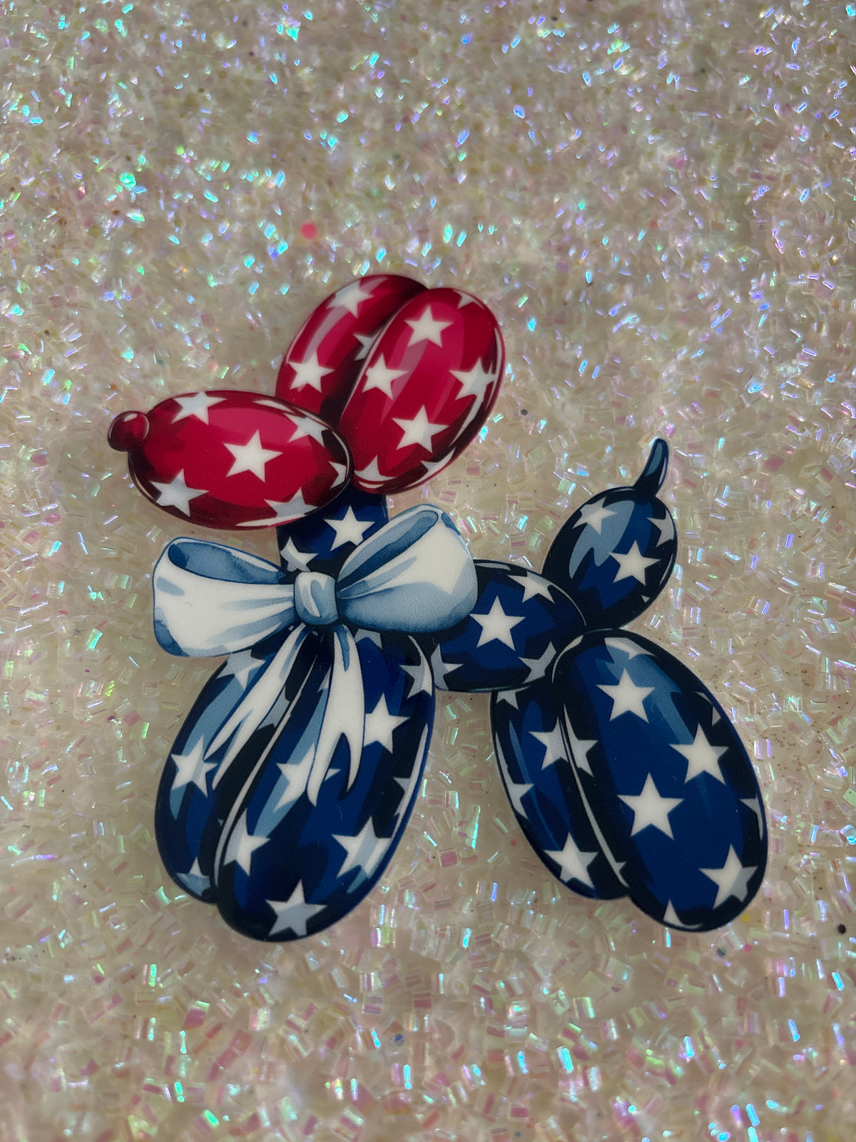 Red, white and blue balloon dog