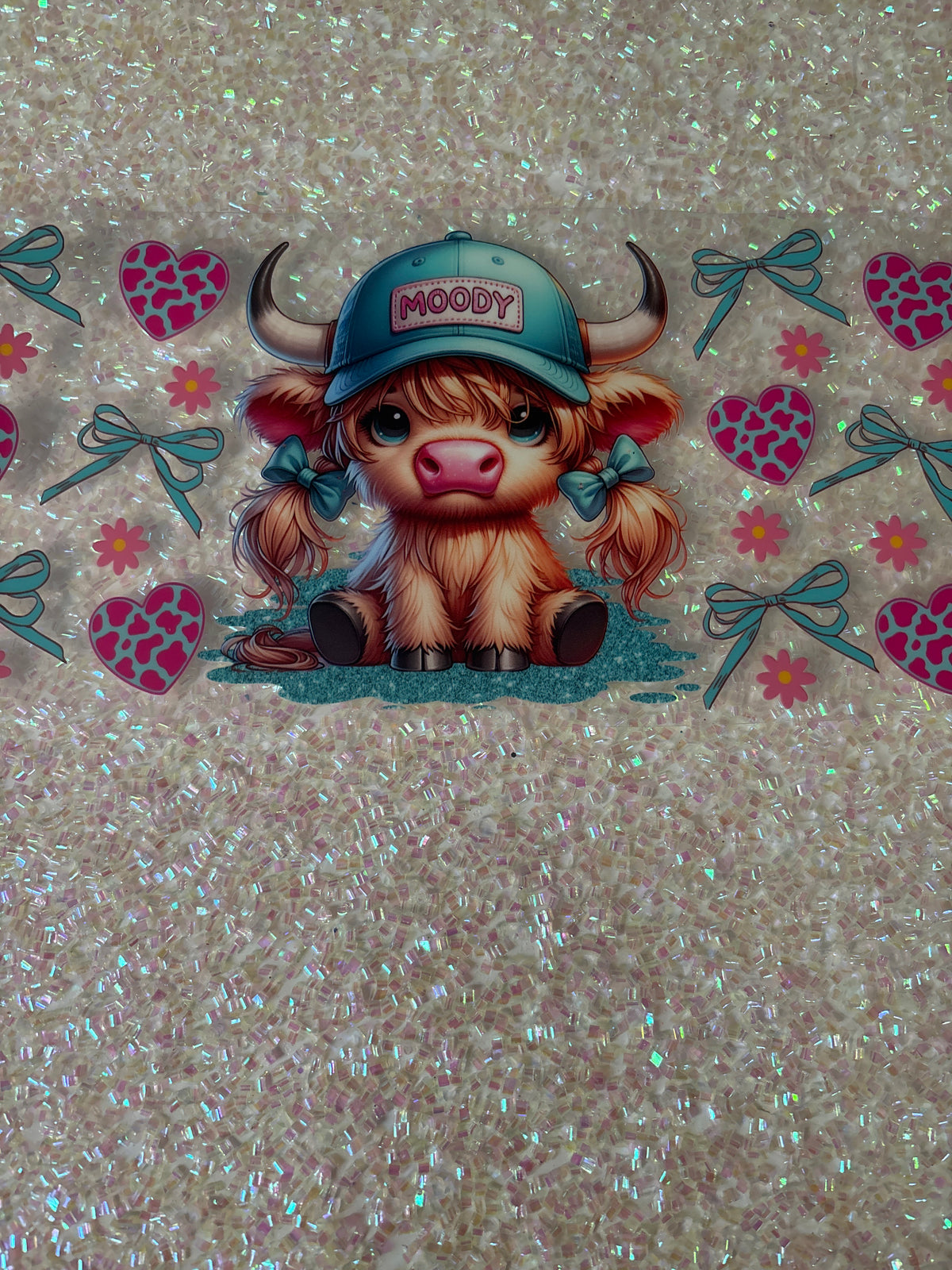 Moody Highland Cow with blue hat