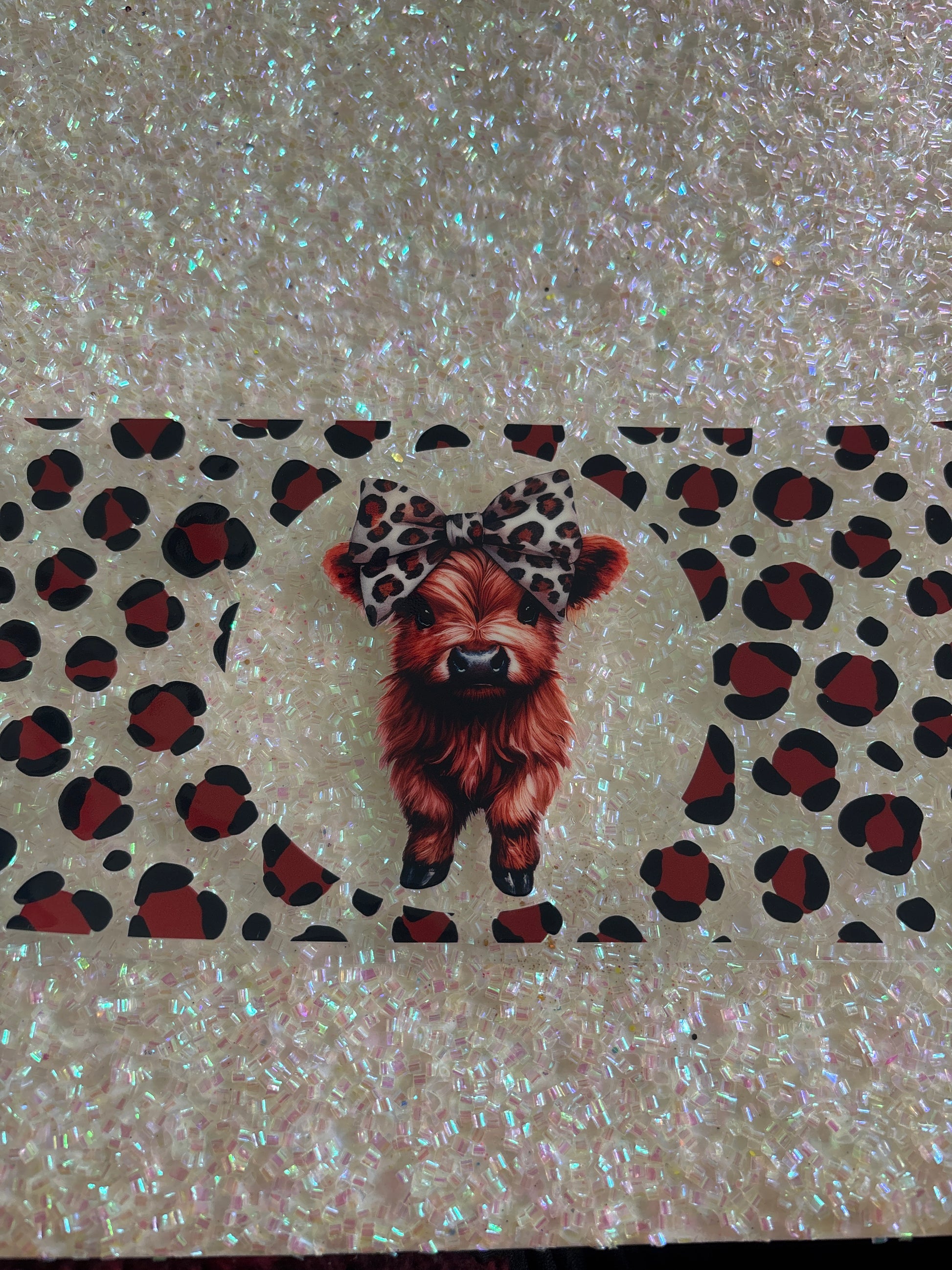 Highland cow with cheetah print