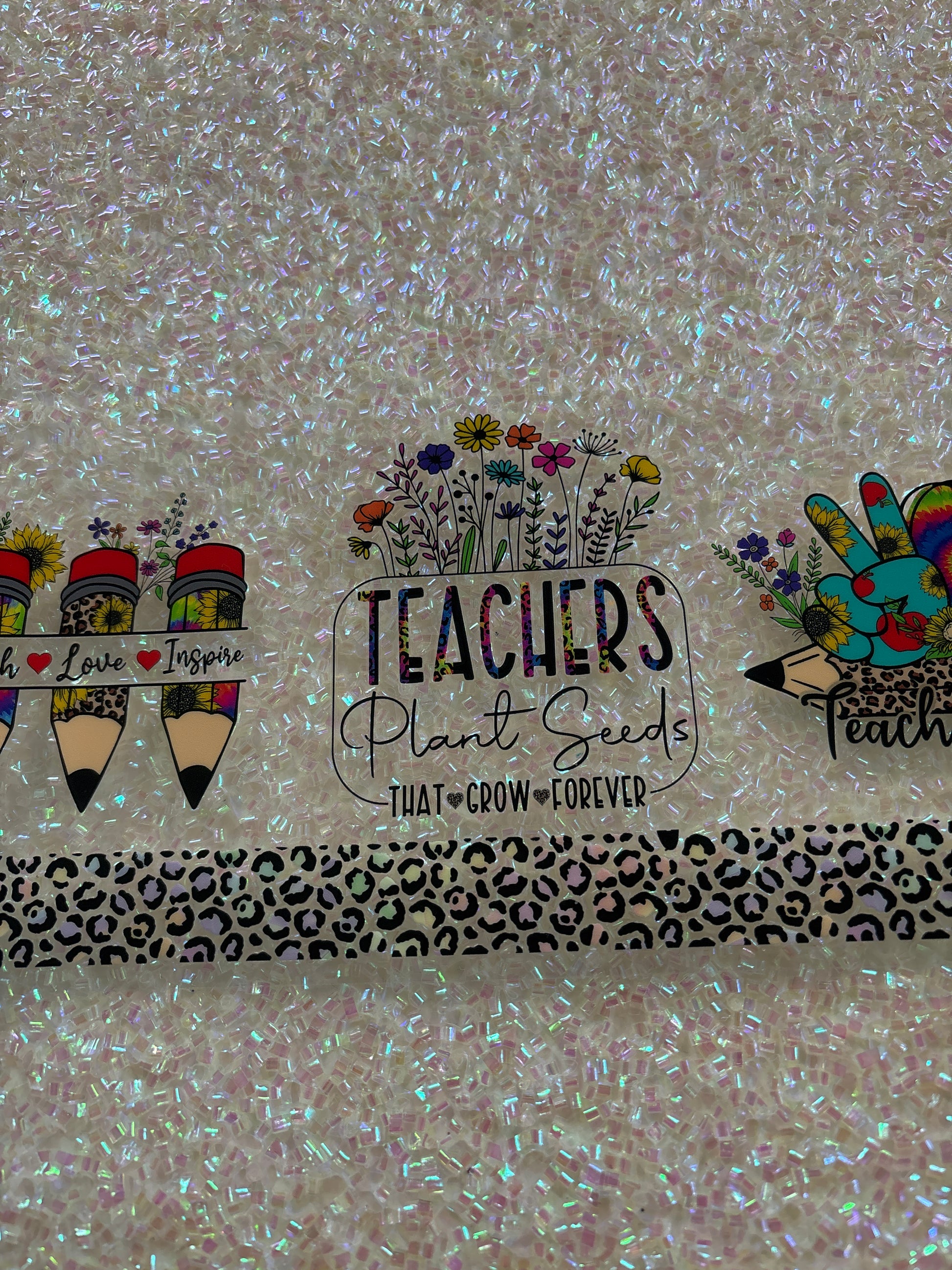 Teachers plant seeds that grow forever flowers and pencils