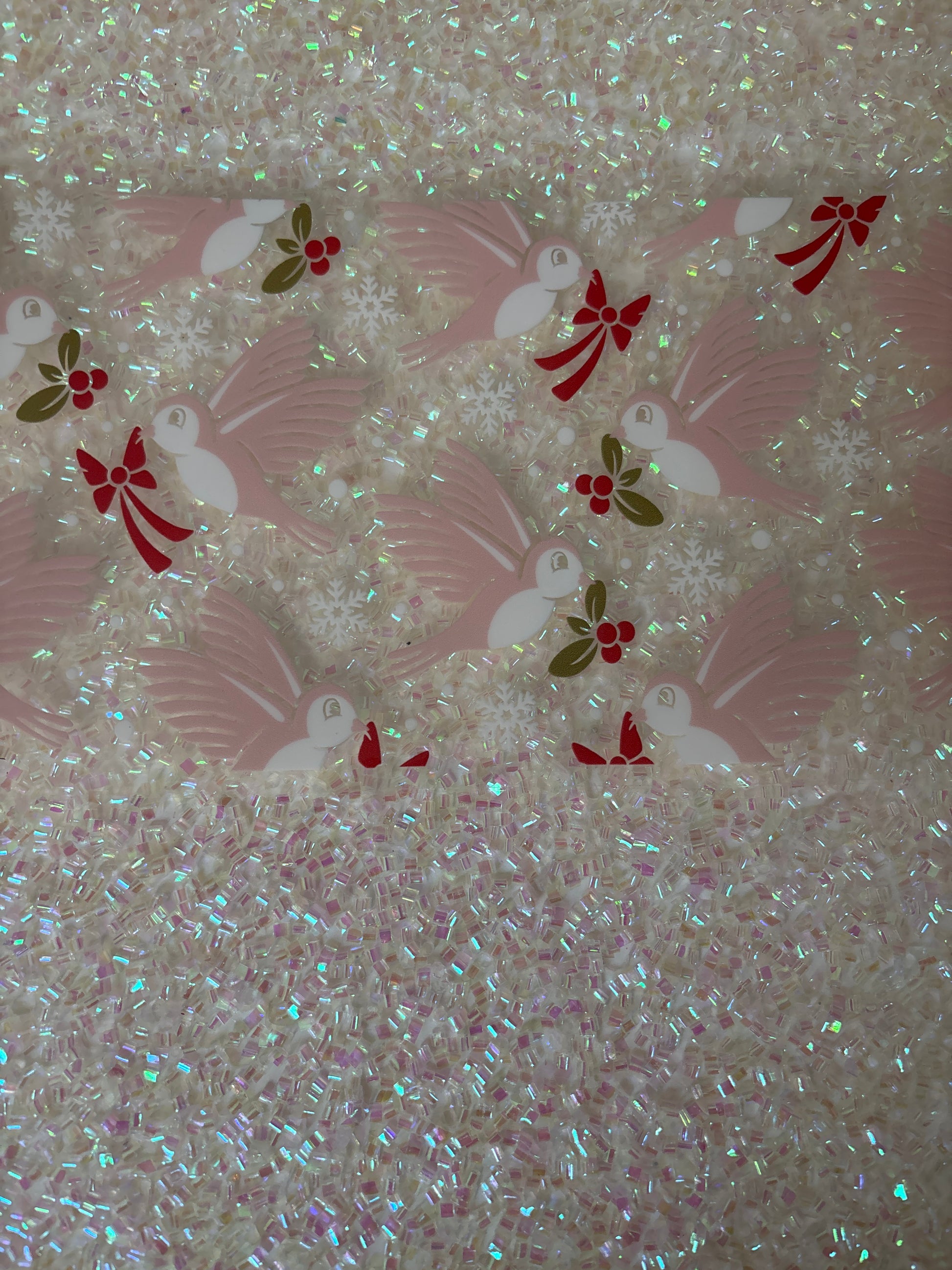 Pink birds with red bows